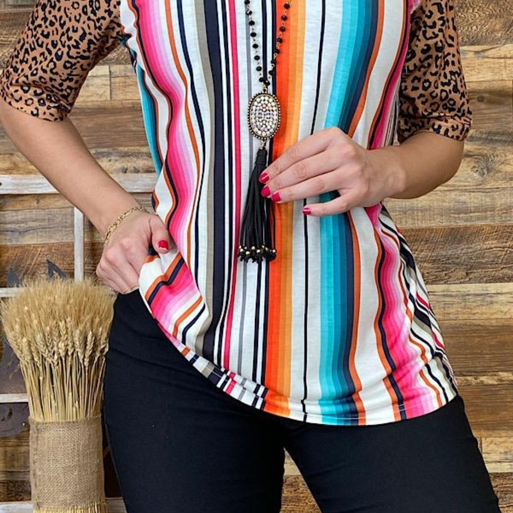 Multicolor serape printed top w/ leopard neckline.